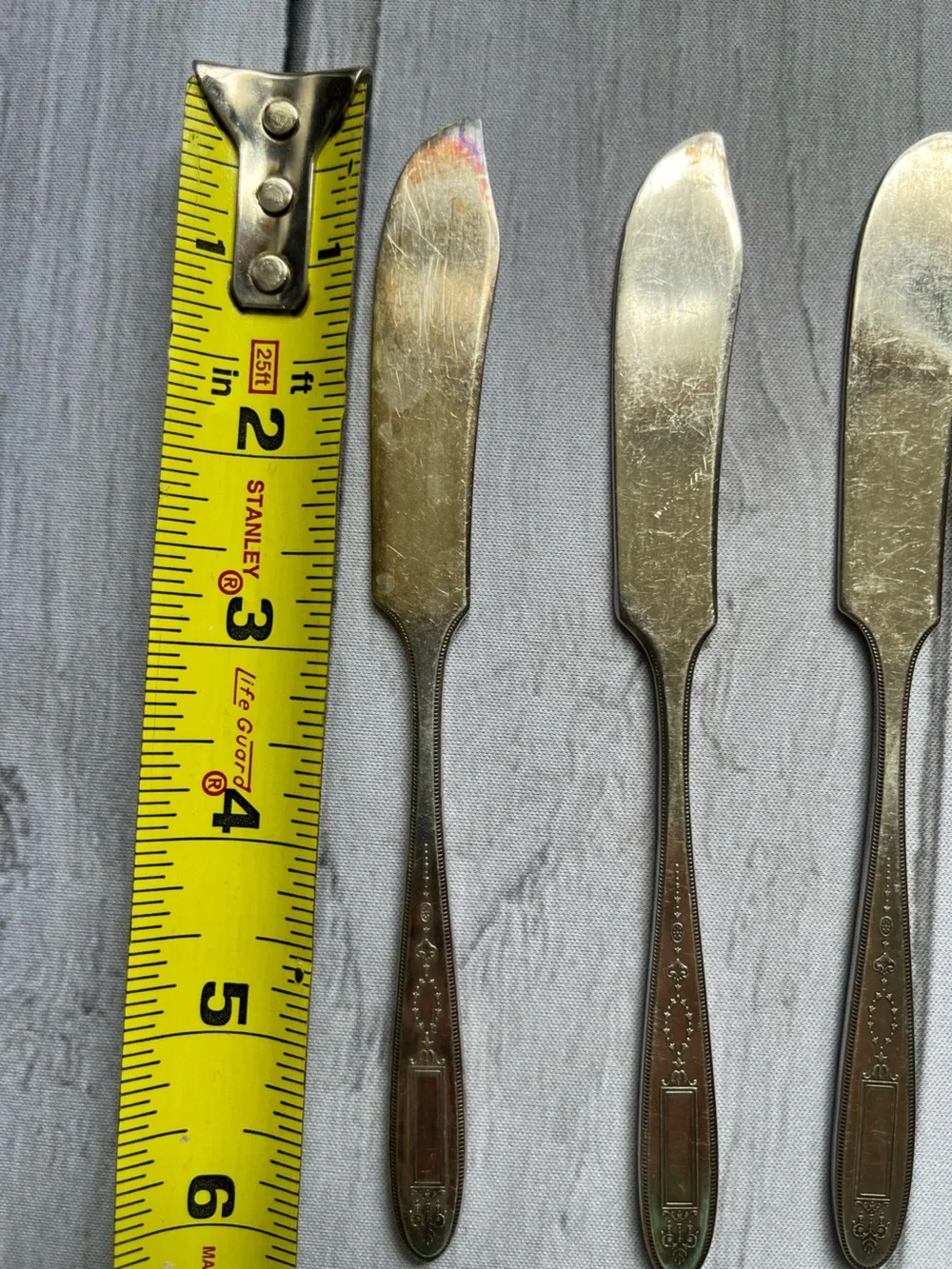 Set of 6 Oneida Community Plate Grosvenor flat handle butter spreaders.